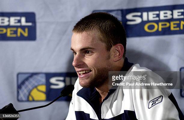Andy Roddick speaks to the press after his match with Kristof Vliegen of Belgium at the 2004 Siebel Open in San Jose, California, February 12, 2004....