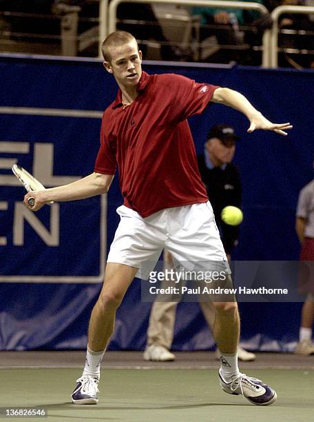 Kristof Vliegen of Belgium hits a return shot during his match with Andy Riddick at the 2004 Siebel Open in San Jose, California, February 12, 2004....