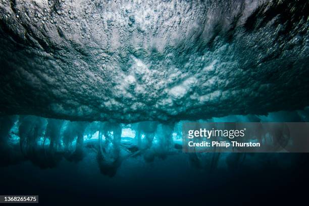 underwater of breaking wave - under water stock pictures, royalty-free photos & images