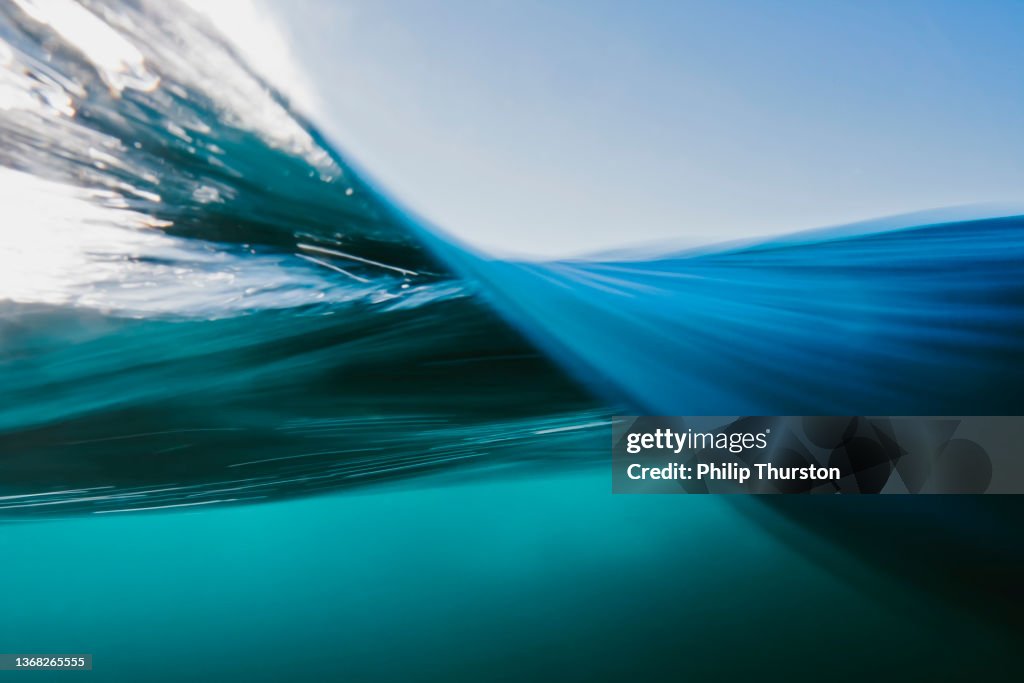 Vortex split view of blue ocean waters surface