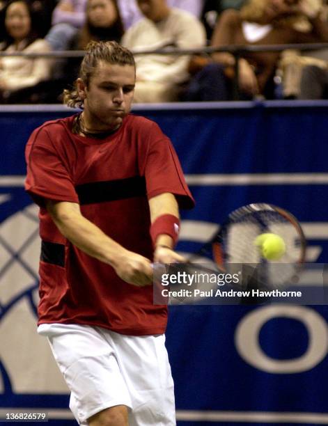 Mardy Fish hits a return shot during his match with Hyung-Taik Lee of at the 2004 Siebel Open in San Jose, California, February 13, 2004. Fish won...