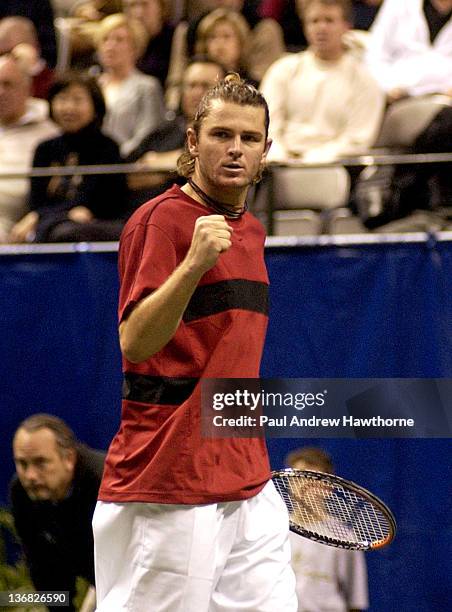 Mardy Fish reacts after winning a point during his match with Andre Agassi at the 2004 Siebel Open in San Jose, California, February 14, 2004. Fish...