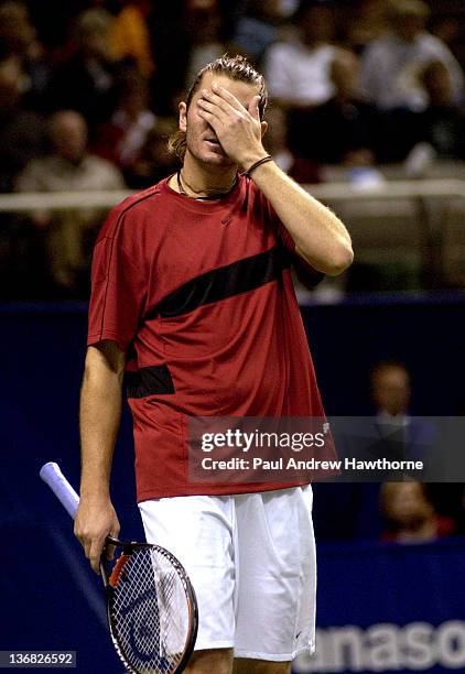 Mardy Fish reacts to the pressure in his match against Andre Agassi at the 2004 Siebel Open in San Jose, California, February 14, 2004. Fish upset...