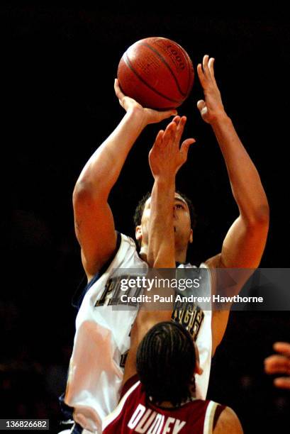 Pittsburgh's Chevron Troutman gets a shot off over Boston College's Jared Dudley during first half action at Madison Square Garden in New York City,...