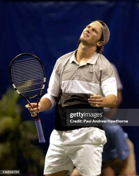 Robert Kendrick shows his disgust with the umpires out call during a return shot in his match with Cyril Saulnier of France at the 2004 Siebel Open...