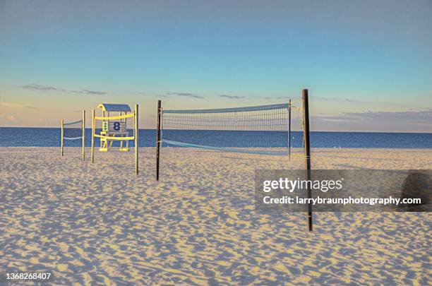 early morning on the volley ball court - gulf shores alabama stock-fotos und bilder