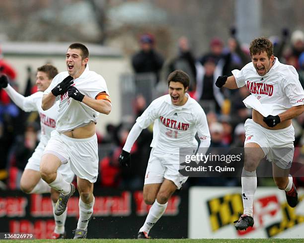 Jason garey#9, Graham Zusi and Chris Lancos#6 race forward after Maryland advance to College Cup with overtime penalty kick victory. Maryland...