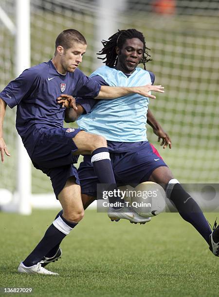 Kyle Martino of the Columbus Crew, left, is challenged by Ugo Ihelmelu of the Galaxy at the 2006 USA World Cup team training session on January 22,...