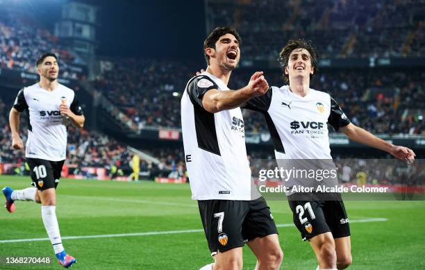 Goncalo Guedes of Valencia CF celebrates with his teammate Bryan Gil of Valencia CF after scoring the opening goal during during the Copa del Rey...