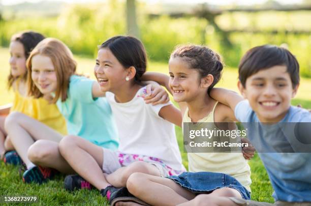 elementary students outside - summer school stock pictures, royalty-free photos & images