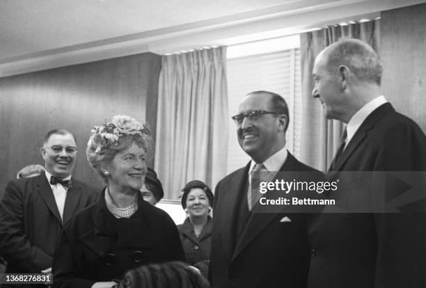 Clifton Wharton , new U.S. Ambassador to Norway, is shown with his wife and Secretary of State Dean Rusk after being sworn into his new post at the...