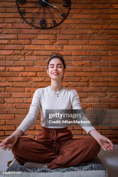 meditation is the way i get the energy and motivation that keeps me going during the day - yoga stock pictures, royalty-free photos & images