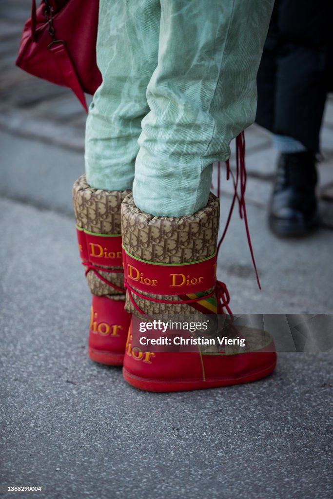 A guest is seen wearing Dior moon boots outside Day Birger et