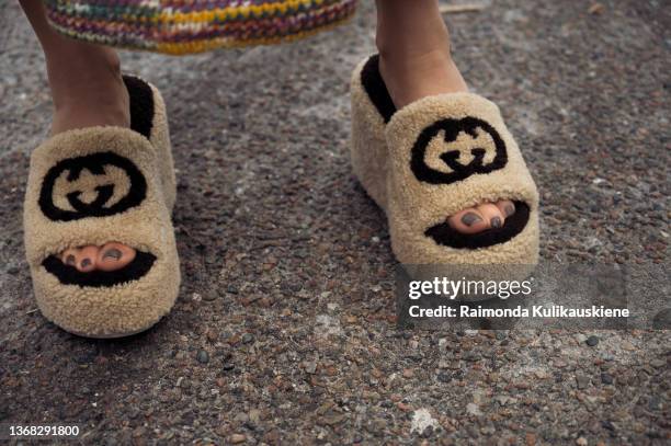 Renia Jaz wearing knitted dress, beige bag, brown jacket and beige Gucci slide sandals outside Day Birger et Mikkelsen in Copenhagen fashion week...