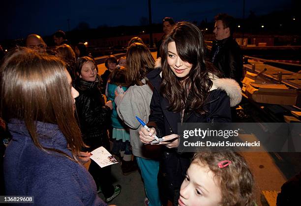 Actress Miranda Cosgrove meets children of military personnel at Naval Submarine Base New London on January 11, 2012 in Groton, Connecticut. Cosgrove...