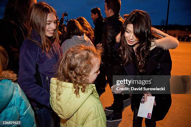 Actress Miranda Cosgrove meets children of military personnel at Naval Submarine Base New London on January 11, 2012 in Groton, Connecticut. Cosgrove...