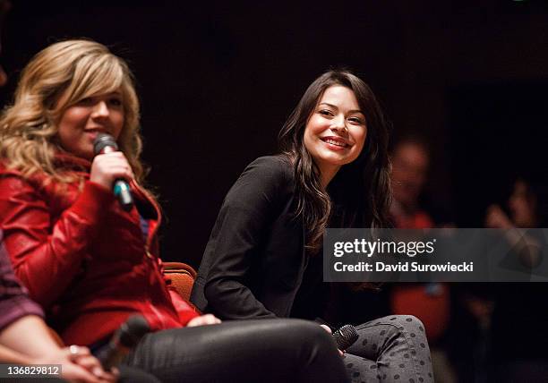 Miranda Cosgrove smiles as Jennette McCurdy addresses the crowd during a question and answer session at Naval Submarine Base New London on January...