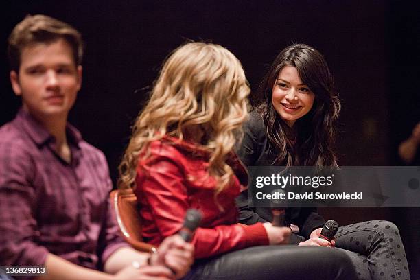 Miranda Cosgrove smiles as Jennette McCurdy addresses the crowd during a question and answer session at Naval Submarine Base New London on January...