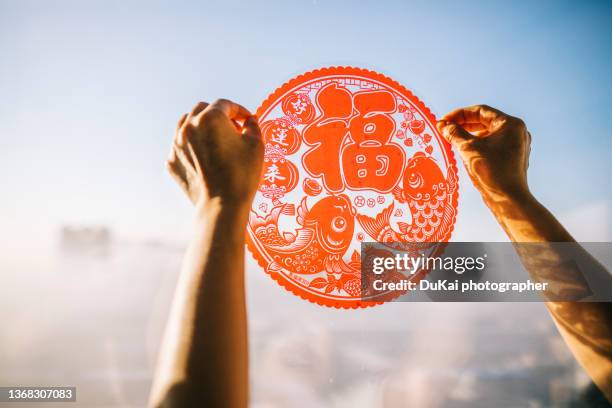 chinese new year elements blessing - 'fu' in window - heritage round one stock pictures, royalty-free photos & images