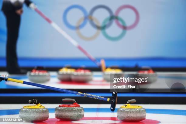 Curling stones sit in the house during the Curling Mixed Doubles Round Robin ahead of the Beijing 2022 Winter Olympics at National Aquatics Centre on...