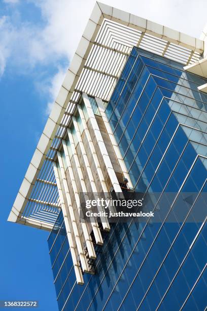 rooftop of futuristic  modern office building in bangkok chatuchak in sky - fensterfront bildbanksfoton och bilder