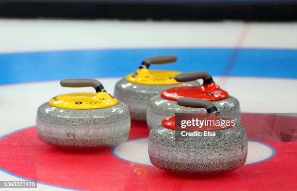 Curling stones sit in the house during the Curling Mixed Doubles Round Robin ahead of the Beijing 2022 Winter Olympics at National Aquatics Centre on...