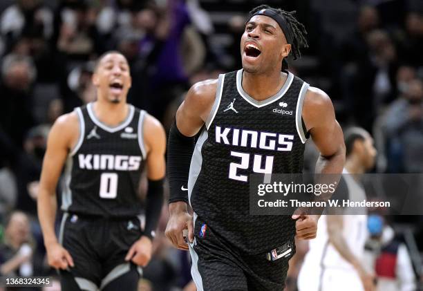 Buddy Hield of the Sacramento Kings reacts after making a thee-point shot against the Brooklyn Nets during the second half of and NBA basketball game...