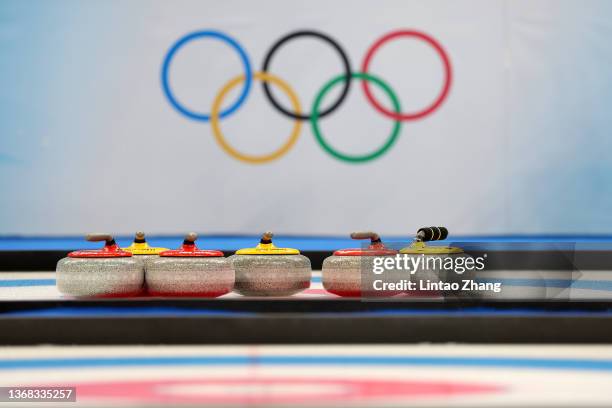 Curling stones sit in the house during the Curling Mixed Doubles Round Robin ahead of the Beijing 2022 Winter Olympics at National Aquatics Centre on...