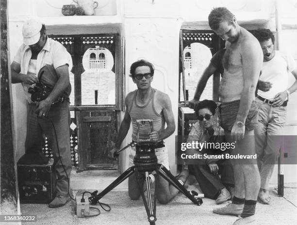 Director Pier Paolo Pasolini behind the camera on the set of the film “Les mille et une nuits” directed by Pier Paolo Pasolini.