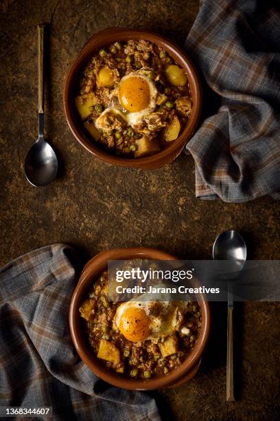 classic potato, pea, tuna and egg stew - egg casserole stock pictures, royalty-free photos & images