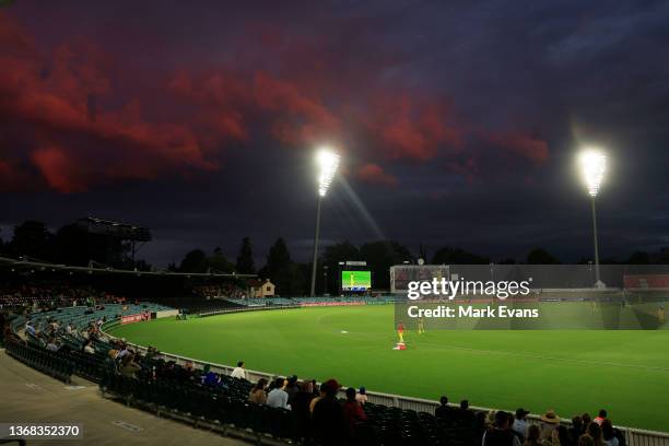 General view as the sun sets 1during game one of the Women's Ashes One Day International series between Australia and England at Manuka Oval on...