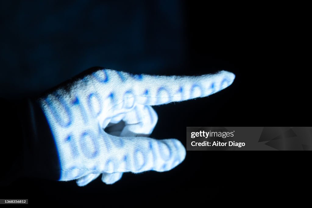 Hand With White Glove And A Binary Code Based On Zeros And Ones On Its ...