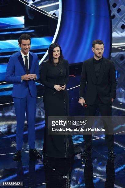 Italian singer Laura Pausini, the English singer-songwriter Mika and Italian TV host Alessandro Cattelan at 72 Sanremo Music Festival. Second...