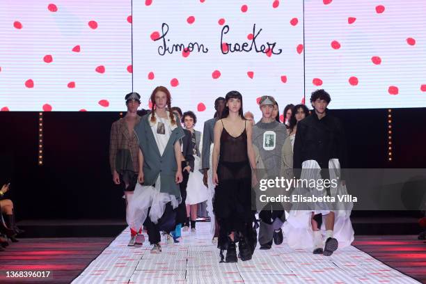 Anna Lou Castoldi and models walk the runway at the Simon Craker "Sulle corna della luna" fashion show during Altaroma 2022 at Cinecitta Studios on...