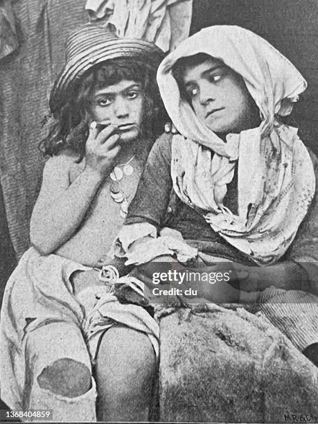 two gypsi girls sitting close together - romani people 幅插畫檔、美工圖案、卡通及圖標