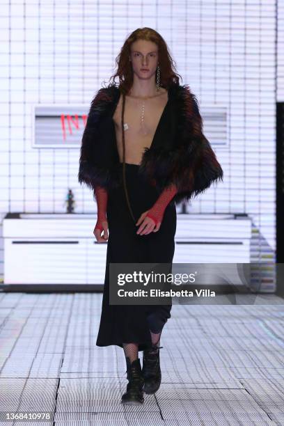 Model walks the runway at the Casa Preti "Innocenza" fashion show during Altaroma 2022 at Cinecitta Studios on February 03, 2022 in Rome, Italy.