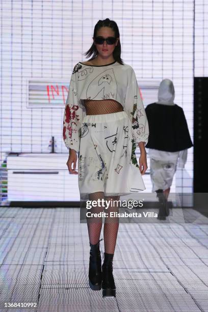 Model walks the runway at the Casa Preti "Innocenza" fashion show during Altaroma 2022 at Cinecitta Studios on February 03, 2022 in Rome, Italy.