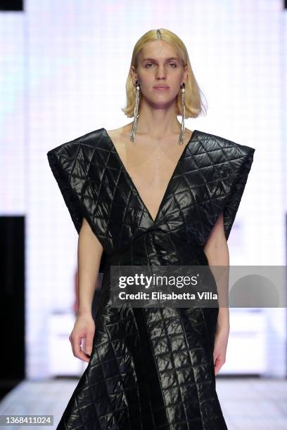 Model walks the runway at the Casa Preti "Innocenza" fashion show during Altaroma 2022 at Cinecitta Studios on February 03, 2022 in Rome, Italy.