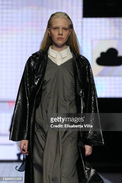 Model walks the runway at the Casa Preti "Innocenza" fashion show during Altaroma 2022 at Cinecitta Studios on February 03, 2022 in Rome, Italy.
