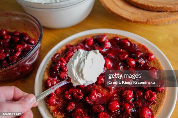 making a cake - cherry pie stock pictures, royalty-free photos & images