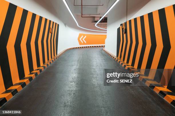 parking lot road / road background / parking ramp - parking entrance stock-fotos und bilder