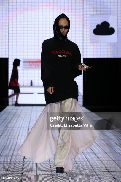 Model walks the runway at the Casa Preti "Innocenza" fashion show during Altaroma 2022 at Cinecitta Studios on February 03, 2022 in Rome, Italy.