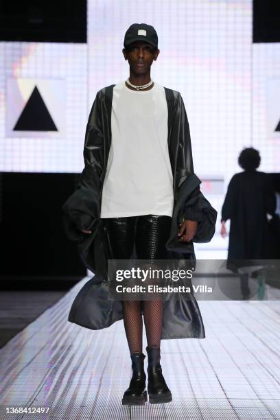 Model walks the runway at the Casa Preti "Innocenza" fashion show during Altaroma 2022 at Cinecitta Studios on February 03, 2022 in Rome, Italy.