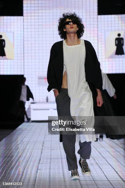 Model walks the runway at the Casa Preti "Innocenza" fashion show during Altaroma 2022 at Cinecitta Studios on February 03, 2022 in Rome, Italy.