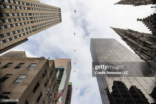 Hellicopters fly overhead during funeral of fallen NYPD officer Wilbert Mora at St. Patrick's Cathedral on February 2, 2022 in New York City. Officer...