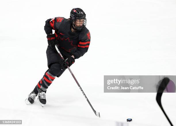 Melodie Daoust of Canada competes during the Women's Ice Hockey Preliminary Round Group A match between Team Canada and Team Switzerland at National...