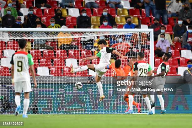 Ahmed Al Hashmi of Al Jazira Club scores their team's second goal during the FIFA Club World Cup UAE 2021 1st Round match between Al Jazira Club and...
