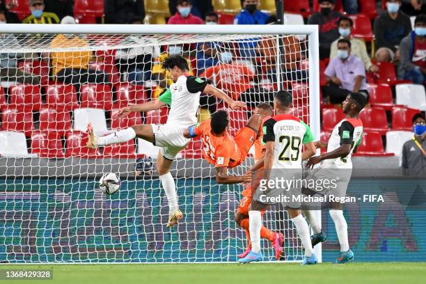 Ahmed Al Hashmi of Al Jazira Club scores their team's second goal during the FIFA Club World Cup UAE 2021 1st Round match between Al Jazira Club and...