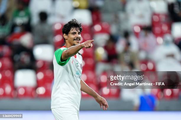 Ahmed Al Hashmi of Al Jazira Club celebrates after scoring their team's second goal during the FIFA Club World Cup UAE 2021 1st Round match between...