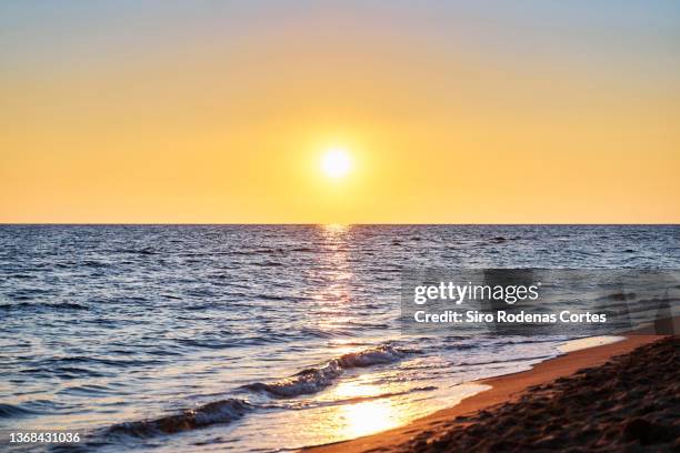 sunset beach background - mediterranean stockfoto's en -beelden